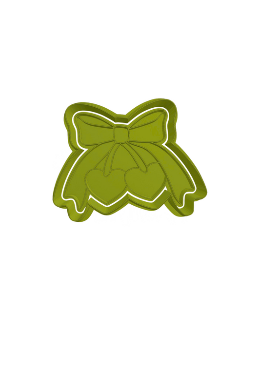 Cereza con moño